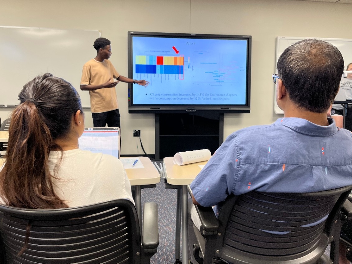 Department of Mathematics and Statistics at Northern Kentucky University A student presents research to peers and faculty.
