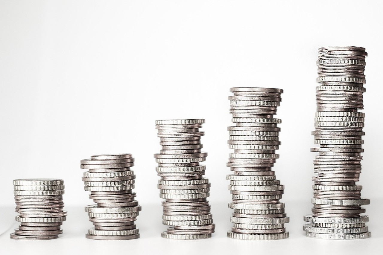 Five stacks of silver coins