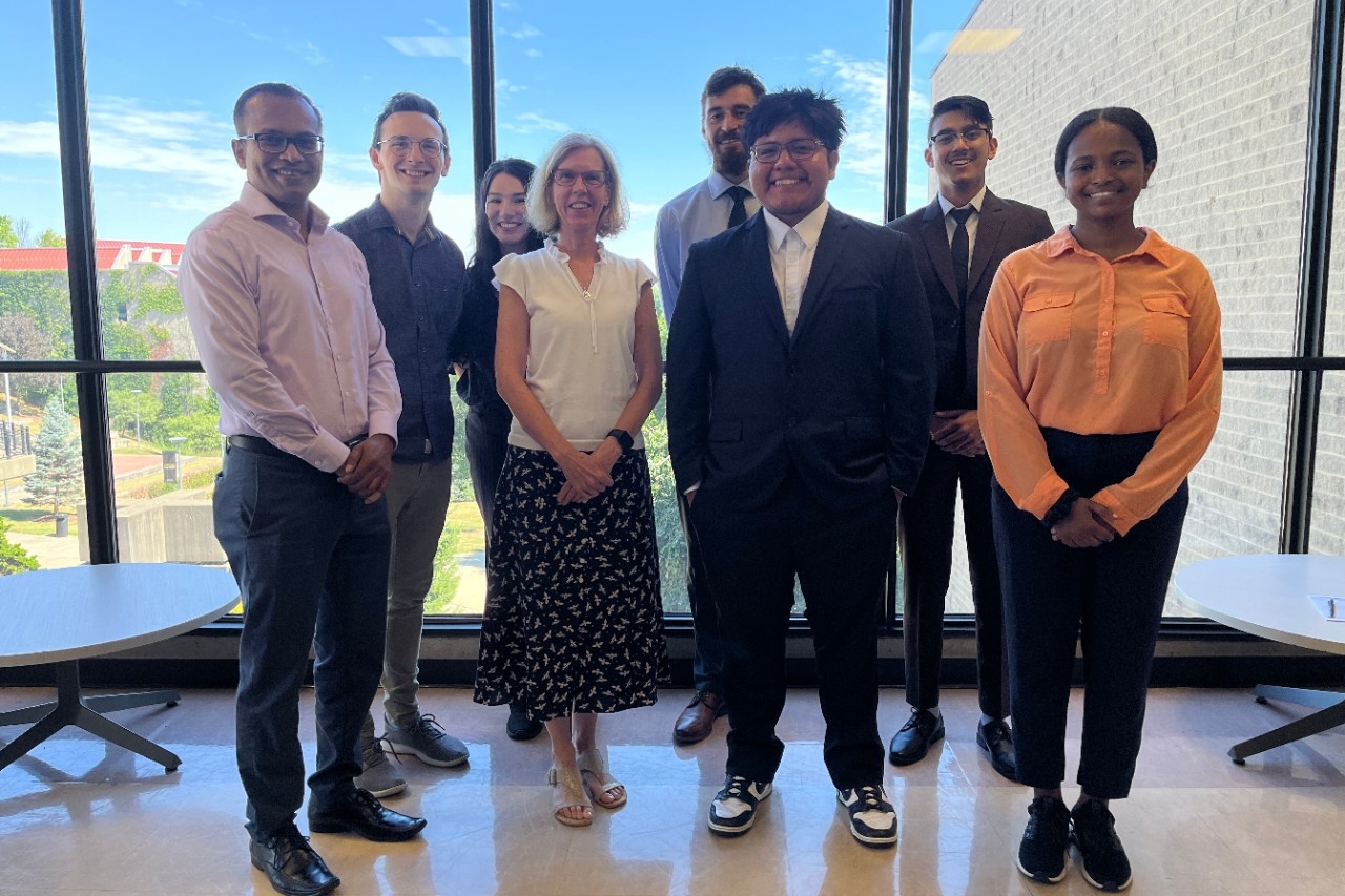 students and faculty at a research event